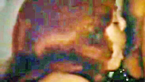 Blurry close-up of woman giving blowjob in celebrity porn compilation