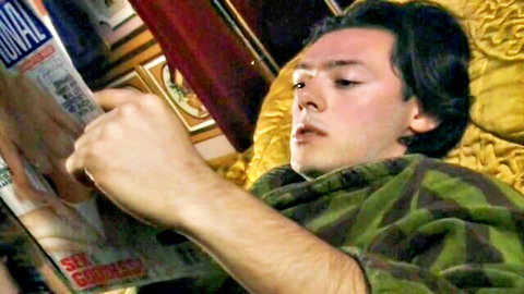 Karen Lancaume lounging in green robe, reading sexy newspaper solo
