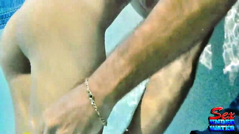 Man in pool teasing with towel, shameless vixen adult scene
