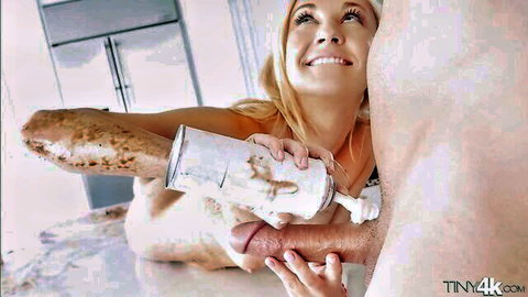 Jade Amber blonde sprays whipped cream on huge cock in kitchen