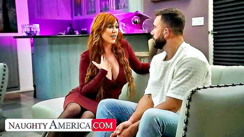 Lauren Phillips redhead in tight red dress with cleavage seducing man