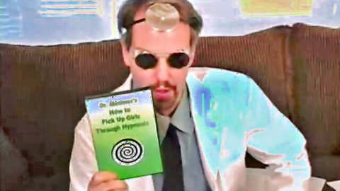 Dr. Hypno in lab coat with erotic pickup hypnosis book