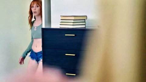 Madi Collins redhead in cropped top and tiny denim shorts, teasing glance