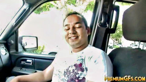 Smiling Asian man eyes closed relaxed in car seat PremiumGFS amateur video