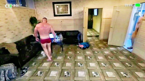 Muscular bald man in red briefs teases in Chaturbate gay cam show