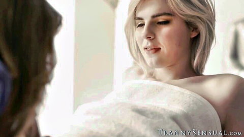 Blonde trans babe Ella Hollywood in sensual white towel after massage