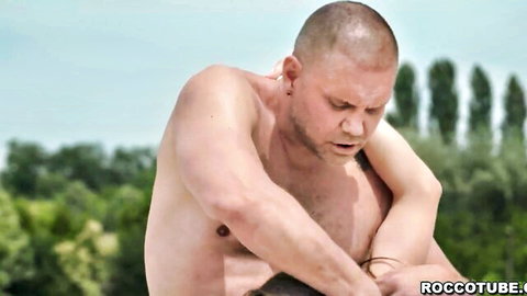 Nacho Vidal muscular and sweating in intense outdoor blowjob with woman