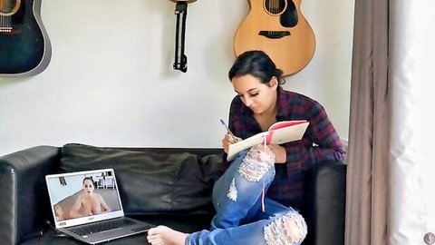 Curvy Latina MILF spreads legs exposing shaved pussy while writing in notebook on webcam with nude guy