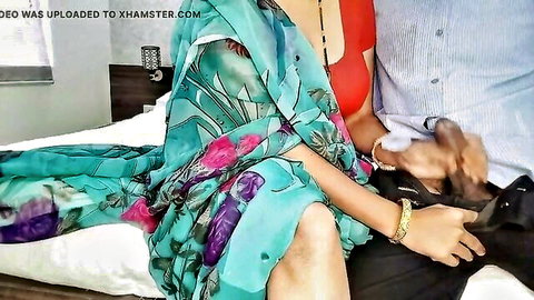 Hot Indian stepmom in green saree seduces stepson with intimate touch on bed