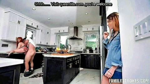 Redhead MILF bent over naked in kitchen with busty stepdaughter and friend