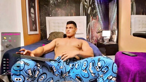 Muscular Za7iro shirtless in blue pajamas on bed solo tease