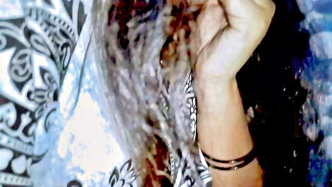 Vaigavarun45, curly-haired Indian wife in patterned dress, teasing pose