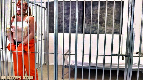 Ebony prisoner Kerry caged in orange jumpsuit for HuCows milking fetish