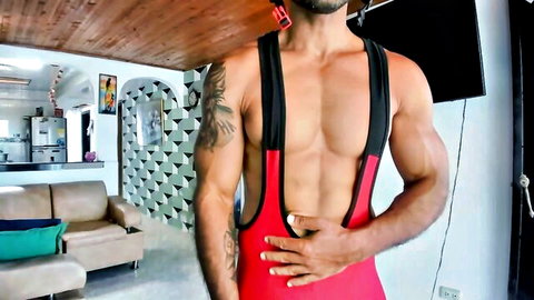 Jhonnyxxfitnexx muscular tattooed man in red singlet exposing abs