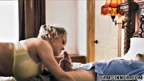 Buxom blonde mommy teases timid son with intimate foot play on bed