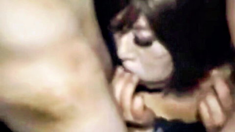 Mature Chinese crossdresser sucking two cocks in explicit BJ scene