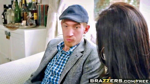 Brunette with big ass sits close to suited man in teasing Brazzers spanking scene