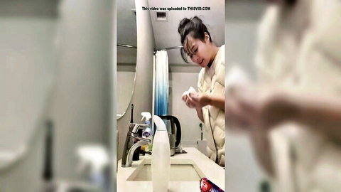 Asian woman coughing wetly in bathroom, solo fetish video thumbnail