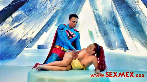Superman cosplay stud fucks busty redhead's pussy while groping her huge tits in hard parody sex.