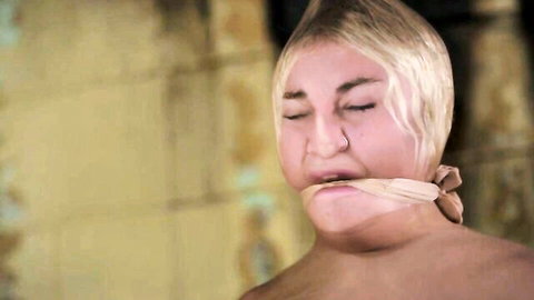 Blonde Zoey gagged and bound topless in BDSM training