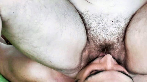 Hairy woman facesitting with explicit vulva view in erotic close-up