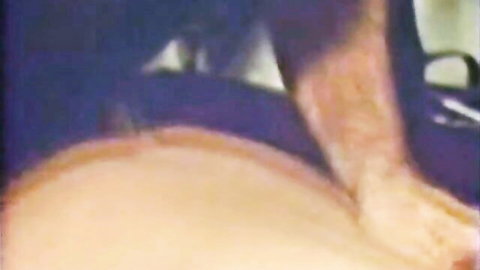 Vintage 1973 close-up of curvy pale ass and thigh in bedroom sex scene