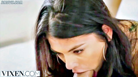 Gina Valentina giving blowjob in bed, close-up oral action