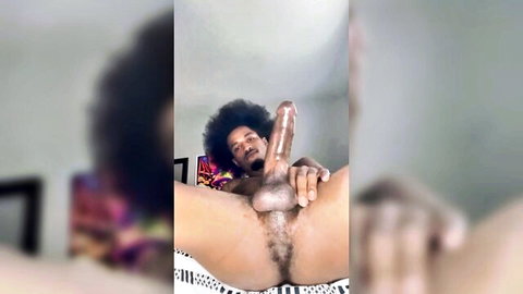 Slim Black man with hairy hole stroking his erect cock solo