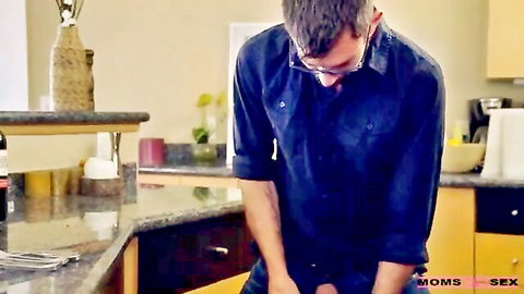 Glasses guy fucks MILF's shaved pussy bent over kitchen counter
