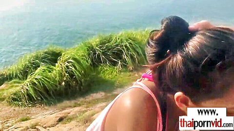 Amateur Thai teen Cherry in pink bikini at sunny beach outdoors