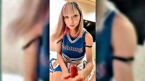 Japanese idol Mayuka in blue cheerleader uniform, teasing handjob pose