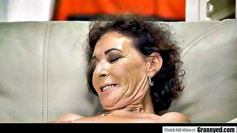 75yo Pixie smiling nude on couch in mature granny porn video