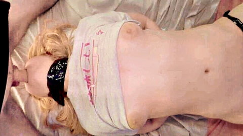 Estie Kay blindfolded and topless, curvy blonde in bondage tease