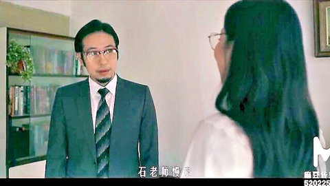 Xia Qing Zi in seductive office scene with suited man, Asian JAV thumbnail