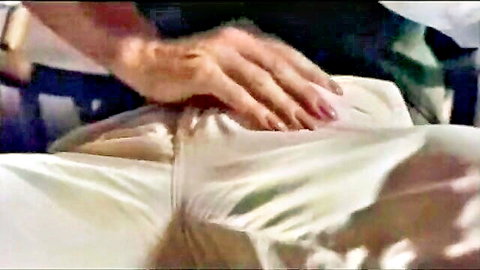 Vintage MILF teasing with hands pressing on white panties