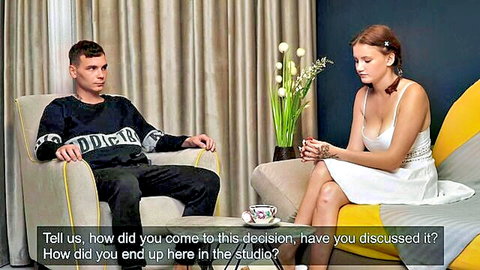Redhead teen babe with big tits cleavage interviewed in studio