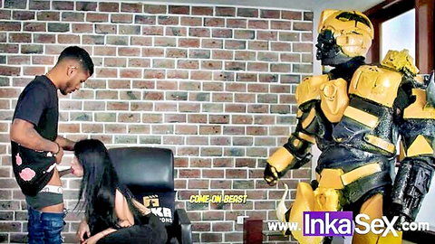 Black stud exposes huge erect cock to long-haired Latina babe sitting spread-legged on chair