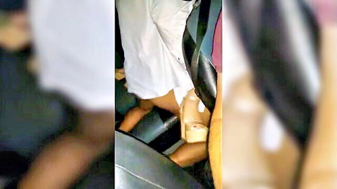 Blurry amateur shots of tan Latina wife spreading legs near black man's crotch in leather car seats