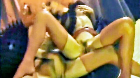 Bound woman in extreme BDSM spread eagle position, Kink studio scene