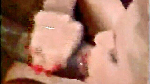 Gina Wild close-up of shaved pussy with explicit details