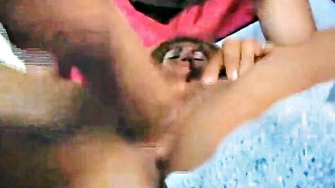 Interracial blowjob close-up, woman in pink top sucking black cock