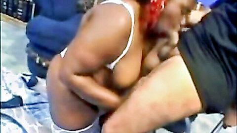 Ebony BBW with red headscarf sucks thick cock in tight white top