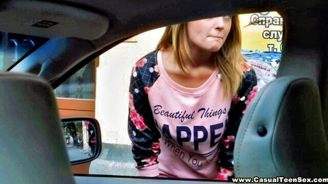 Hot blonde teen in pink sweatshirt inside car, casual amateur vibe