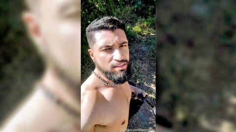 Bearded Latino man shirtless in forest, teasing big ass nude