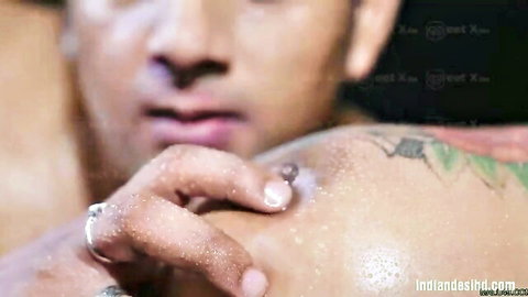 Tattooed Asian man receiving oily nipple touch in step mom therapy session