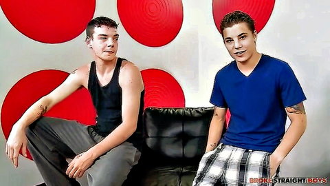 Ryan Fields and Tyler White posing clothed on couch in gay amateur scene