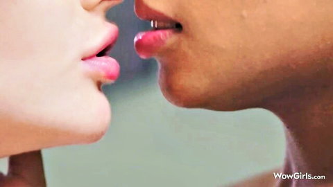 Sofi Vega and Matty in passionate lesbian kiss, close-up lips