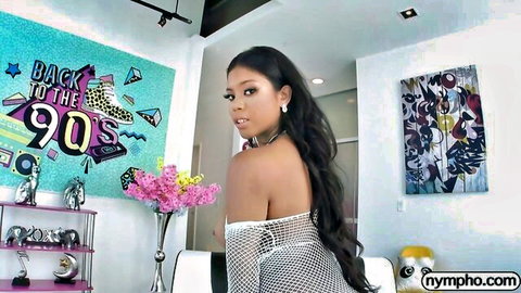 Nia Nacci in sheer white top, seductive pose, curvy ebony beauty