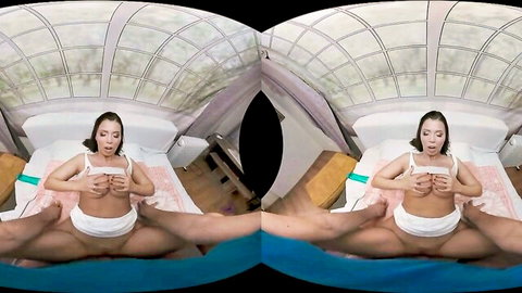 Slim brunette exposing medium tits and spreading legs in solo amateur scene