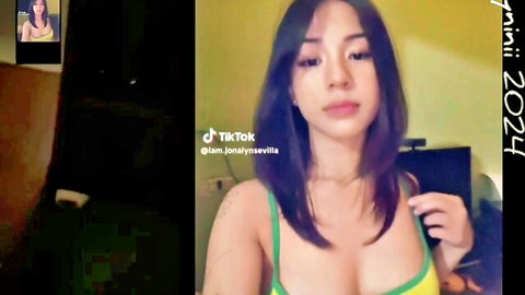 Lyninii Pinay influencer in sexy green top, showing cleavage on cam
